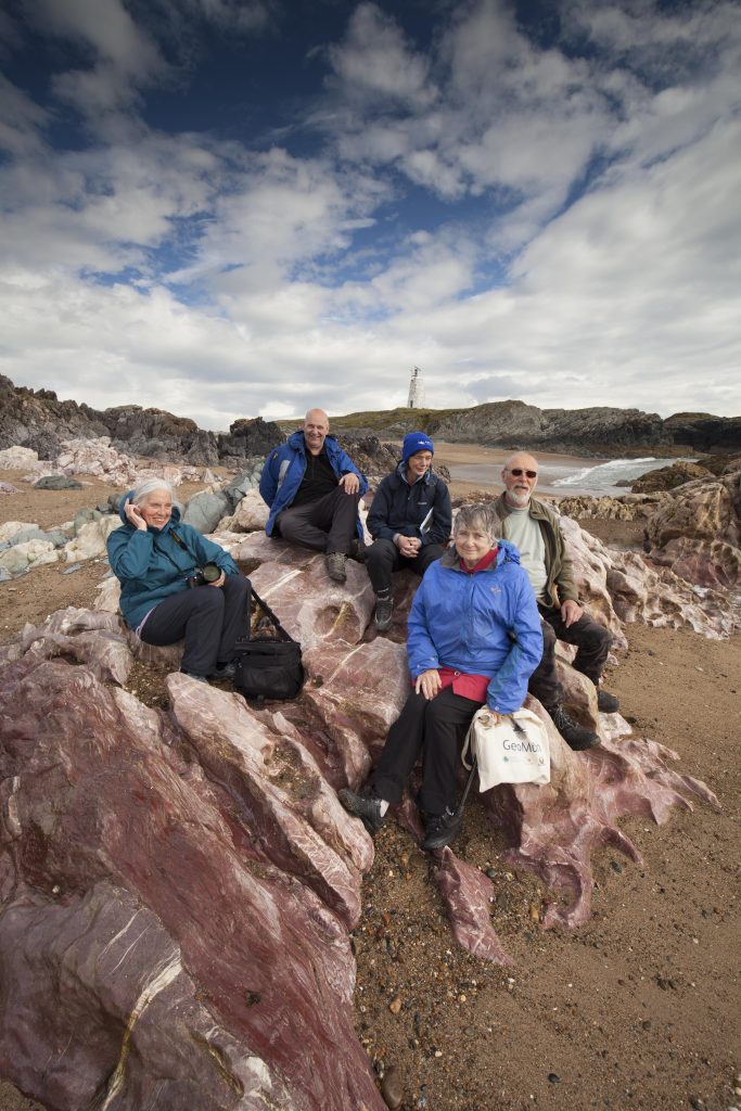 Margaret Wood at the Mélange on Llanddwyn Island (in blue). Image by kind permission of author, S